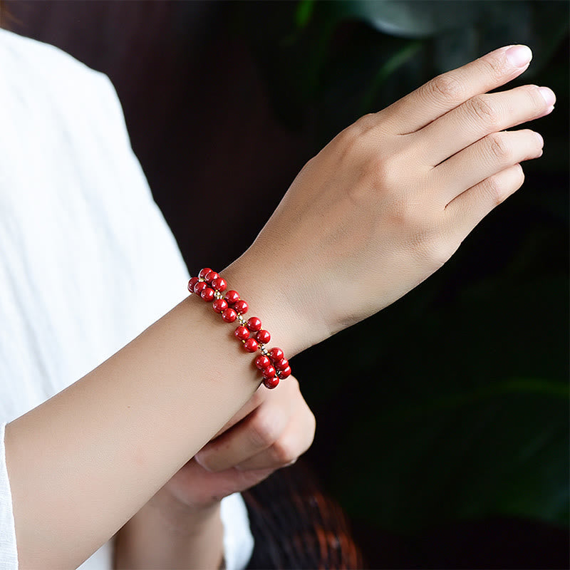 Armband Zinnober – Segen Harmonie rote Perlen elastisch Handgelenk getragen