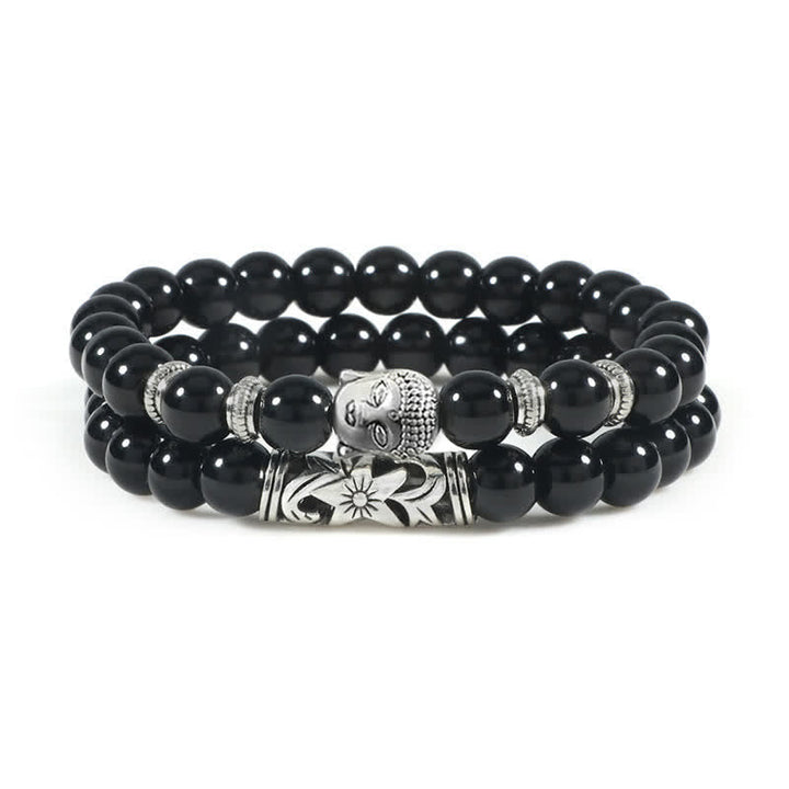 Schwarzes Achat Armband mit Buddha Kopf Charm elegant getragen