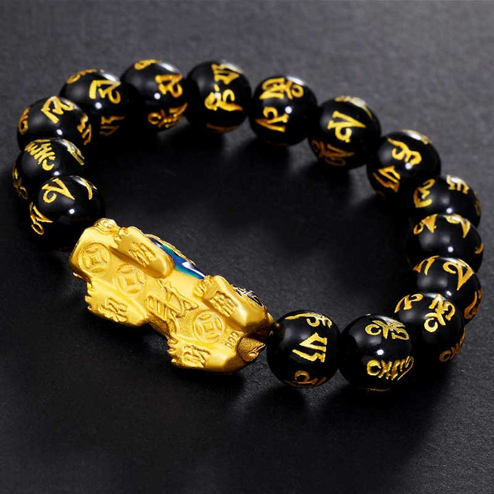 Schwarzes Obsidian Armband Om Mani Padme Hum mit goldener Pixiu Perle Nahaufnahme