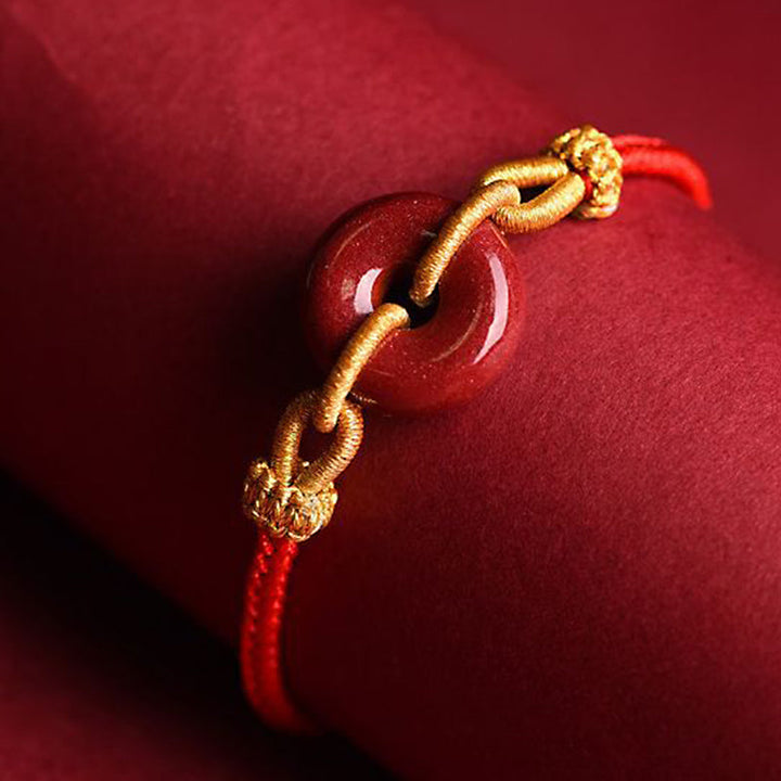 Armband Zinnober – Frieden & Segen Energie mit goldenem Verschluss rotes Band