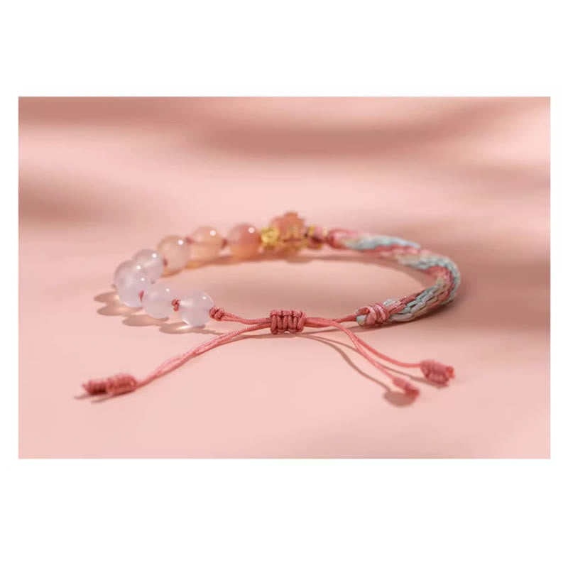 Armband Achat Pfirsichblüte rosa Naturstein elastisch elegant Handgelenk getragen