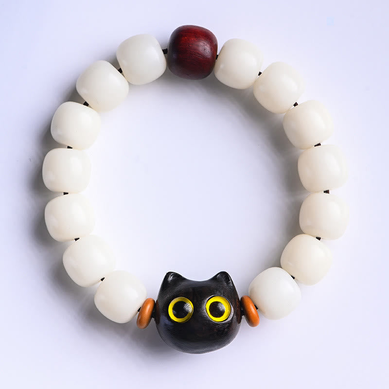 Armband Sandelholz Bodhi Katze Glück schwarze Perlen weiß elastisch.