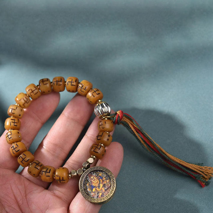Armband Kamelknochen mit Schutz Anhänger und buntem Quaste elastisch