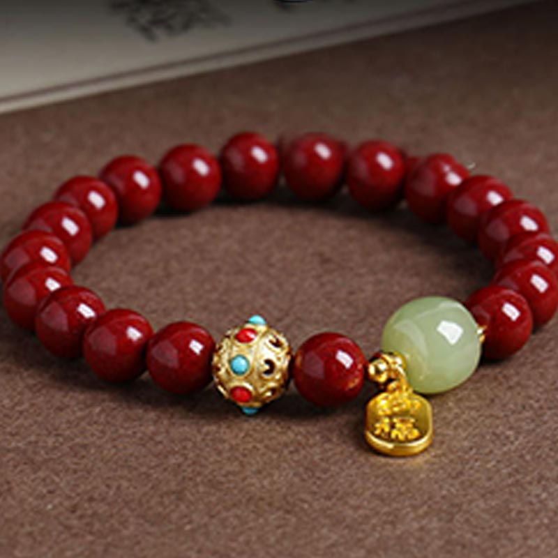 Armband Grüner Aventurin Zinnober rote Perlen goldene Verzierungen Flachansicht