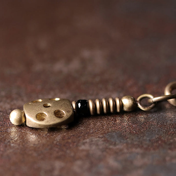 Armband Obsidian Kupfer mit Kunsthandwerk Details elegantes Design