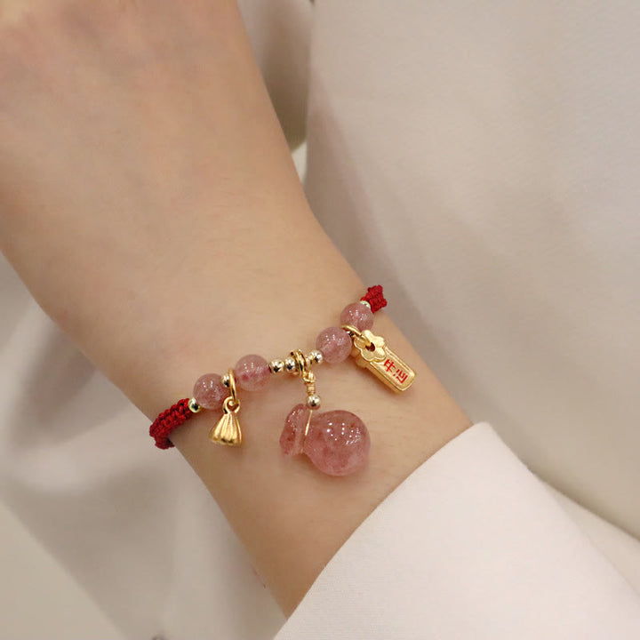Armband Erdbeerquarz Lotus – Heilung rosafarbene Perlen Gold Anhänger