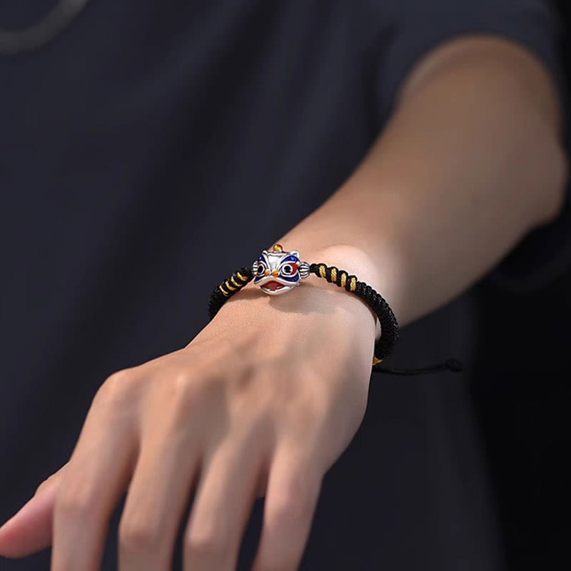 Armband Tanzendes Löwe Glück Geflochten – Glück am Handgelenk getragen schwarz gold