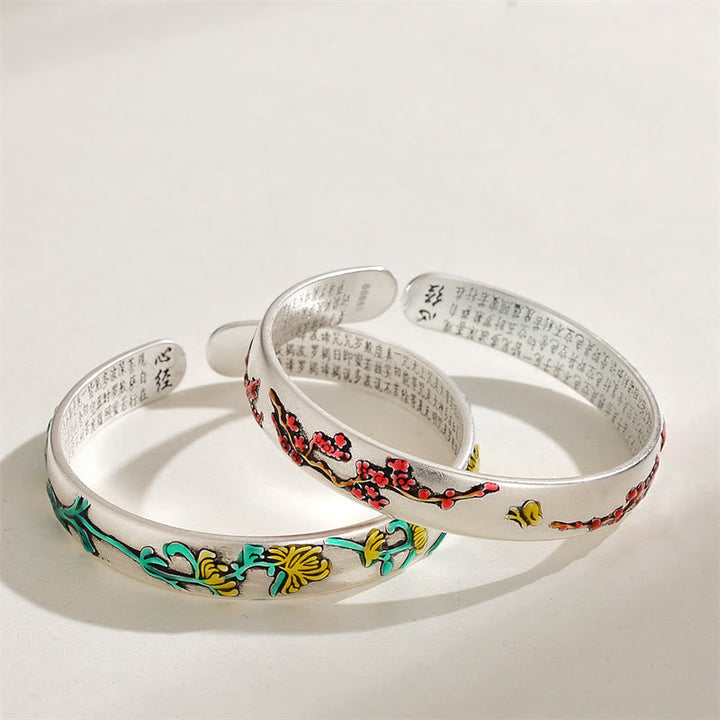 Armband Herzsutra – Heilung mit chinesischen Schriftzeichen und Blüten.