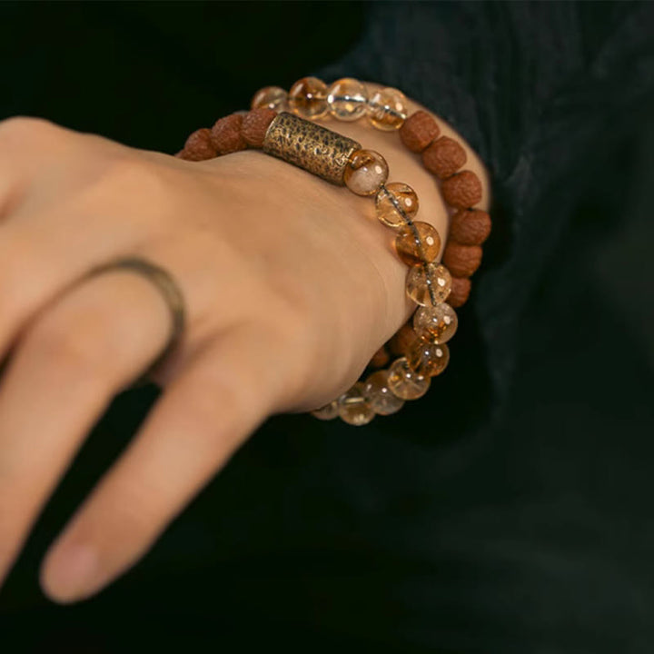 Armband Citrin Kristall – Wohlstand am Handgelenk getragen braun golden