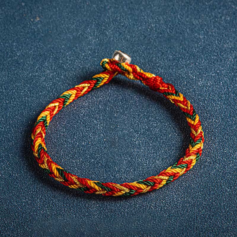 Armband Mehrfarbig – Schutz & Glück fürs ganze Jahr Flatlays geflochtenes Seil rot gelb grün