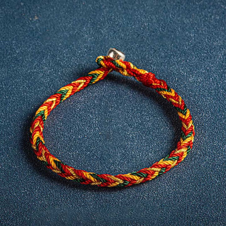 Armband Mehrfarbig – Schutz & Glück fürs ganze Jahr Flatlays geflochtenes Seil rot gelb grün