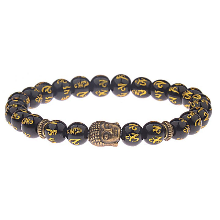 Schwarzes Armband Tibet Buddha Mantra Amulet mit goldenen Schriftzeichen Flachansicht