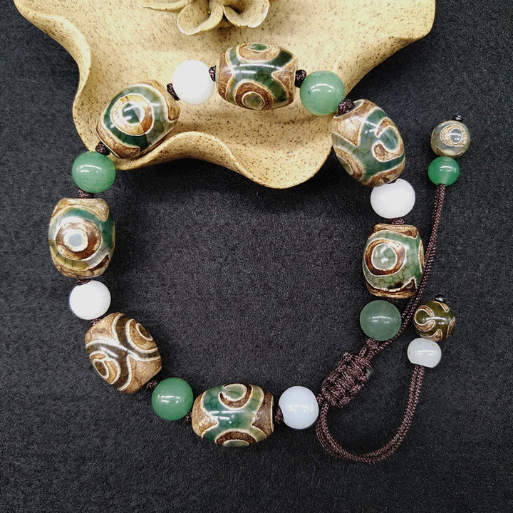 Armband Dzi Perle Schutz Glück grüne weiße Perlen Naturstein