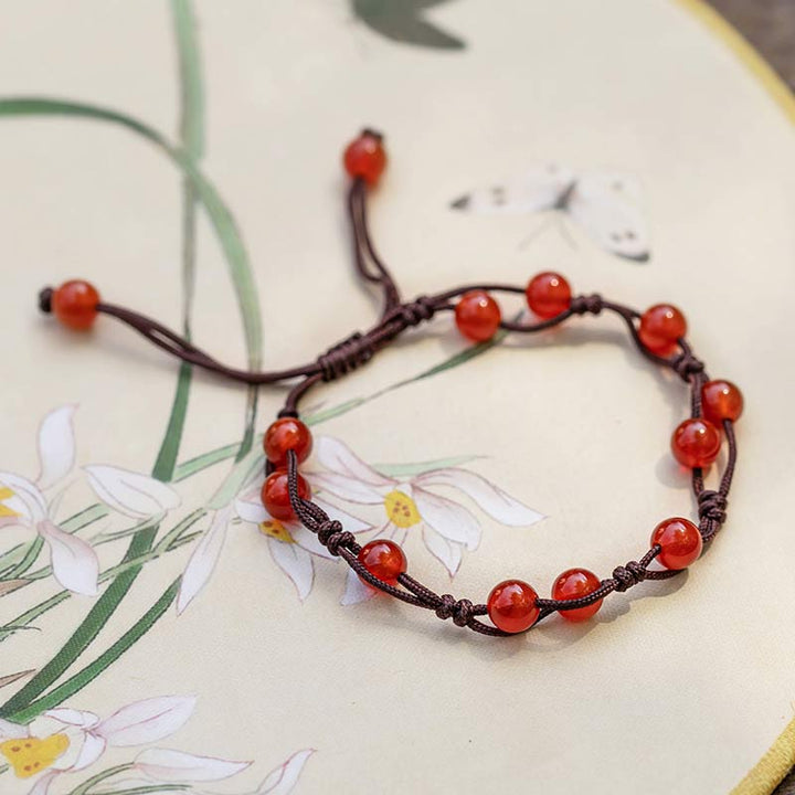 Armband Roter Achat Zinnober – Ruhe mit braunem Seidenband elastisch