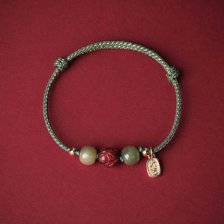 Armband Zinnober Jade Lotus – Glück mit grünen Steinen elastisch