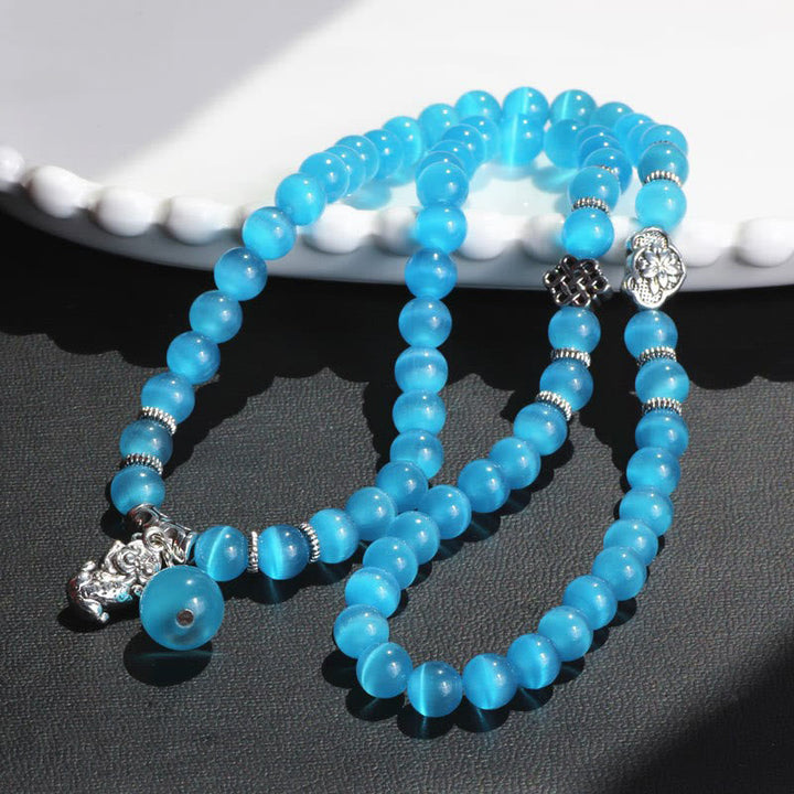 Armband Katzenauge PiXiu Dreifach blau elastisch Naturstein Silber.