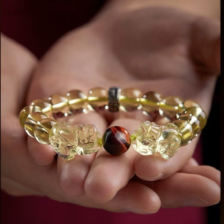 Armband Tigerauge Citrin Pixiu mit goldenem Glanz und Schutzstein eleganz