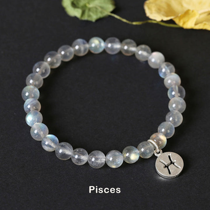 Mondstein Armband mit Fische Charm Naturstein Perlen elastisch.