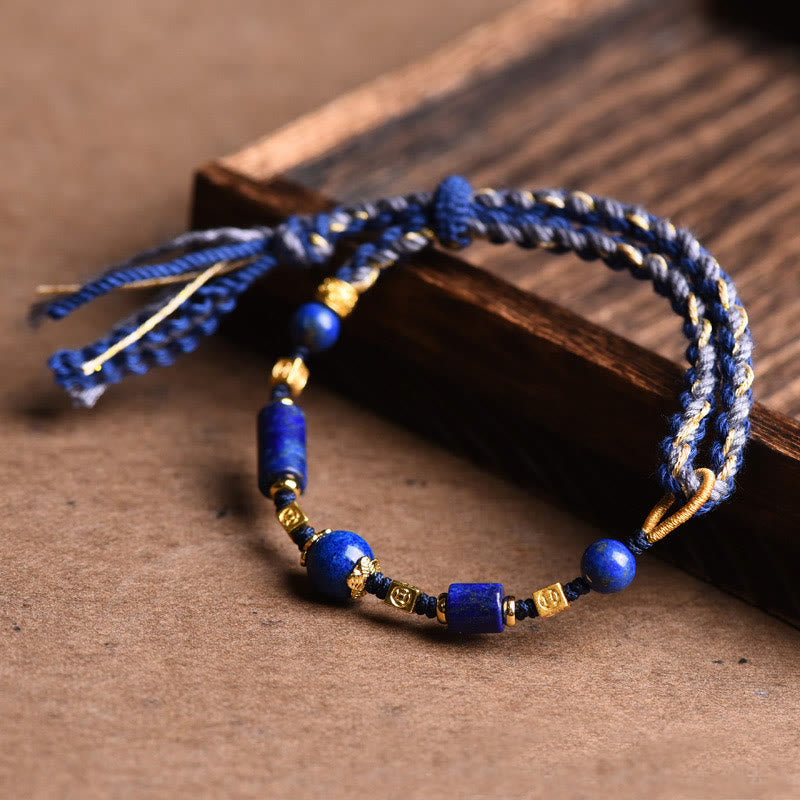 Armband Lazurit Perle Positiv blauer Stein Holz Hintergrund elegant