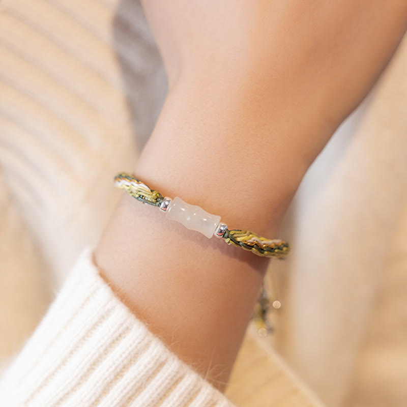 Armband Weiße Jade Bambus am Handgelenk mit goldenem Seil elastisch