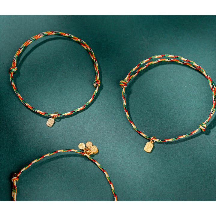 Armband Fu-Zeichen Glück Frieden Energie bunte Kordel Gold Charms