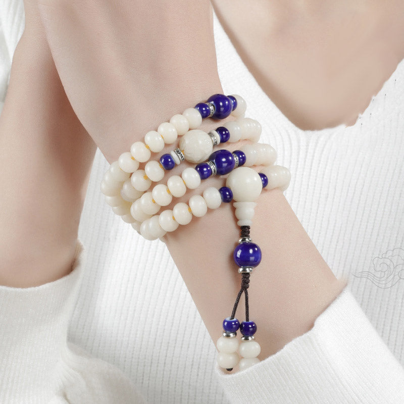 Armband Bodhi Lotus – Segen weiß blau Perlen elastisch Handgelenk