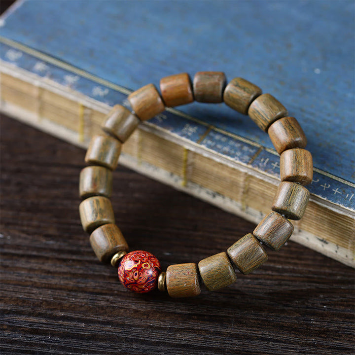 Armband Sandelholz – Frieden Balance mit roter Perle Naturholz elastisch