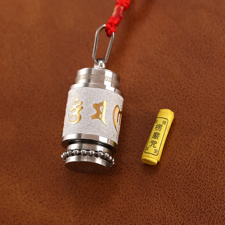 Titanium – Weisheit – Bild 6 – Titanium Weisheit Anhänger mit goldenem Symbol rotes Kordelband
