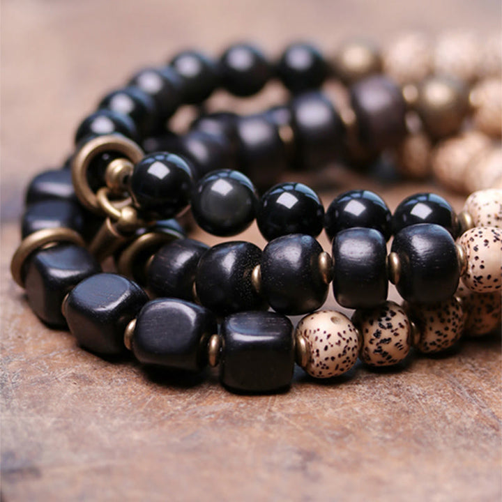 Armband Schwarzer Obsidian Kupfer Perlen glänzend elastisch Naturstein Schmuck