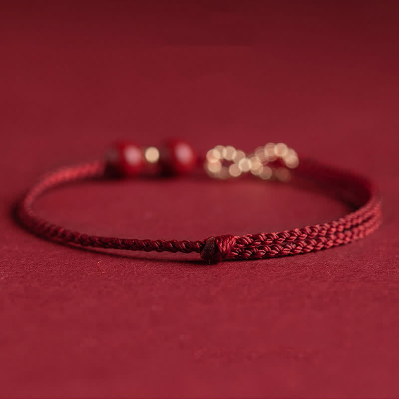 Armband Rotes Band Gold Infinity Symbol