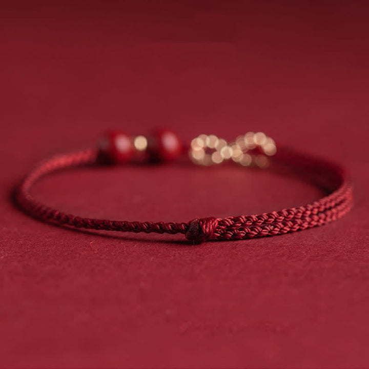 Armband Rotes Band Gold Infinity Symbol