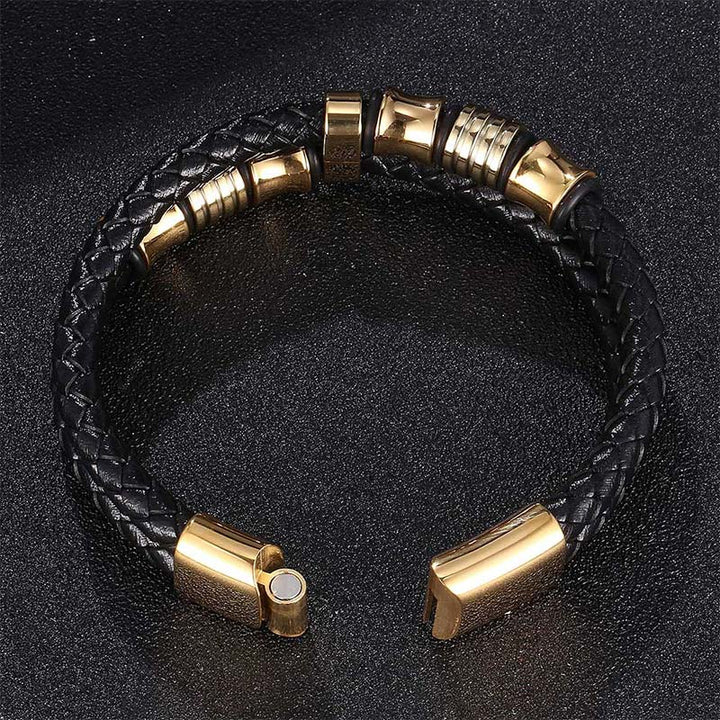 Schwarzes Leder Weave Armband mit goldenen Verschlüssen Flachaufnahme