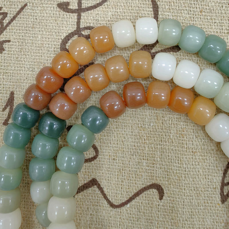 Mala Bodhi Frieden Harmonie Perlenarmband Grün Weiß Orange Naturstein.