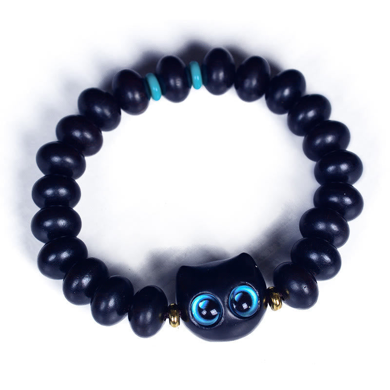 Armband Ebenholz Katze schwarze Perlen blaue Augen Liebe Frieden elastisch