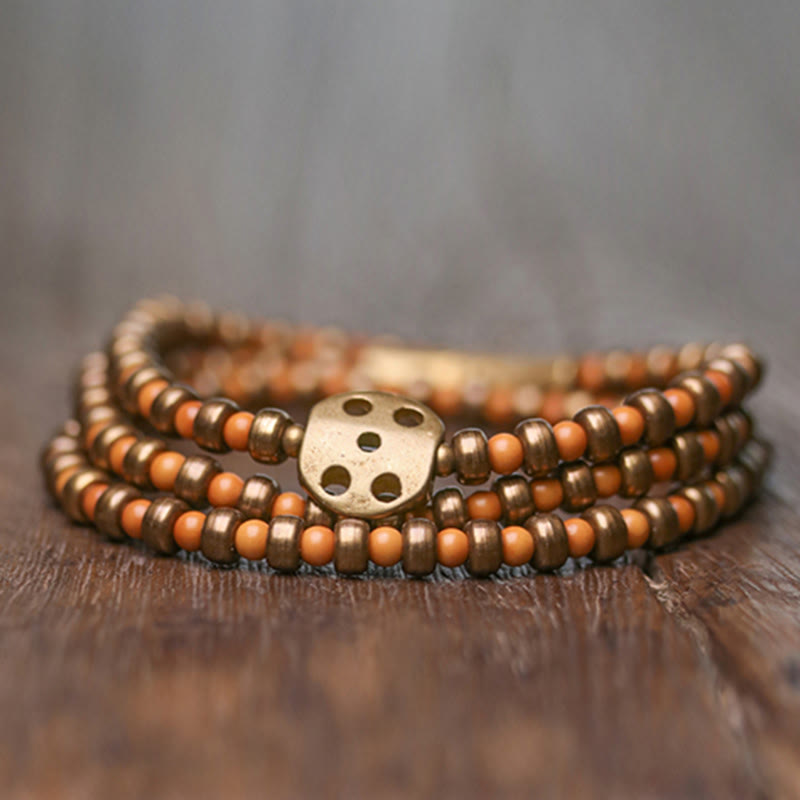 Armband Kupfer – Wohlstand Stärke mit Würfel Charm elegant gewickelt