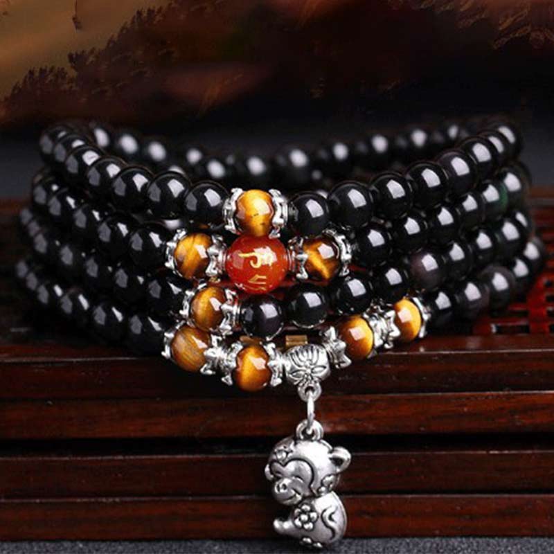 Schwarzes Obsidian Tigerauge Armband mit silbernem Pixiu Anhänger elegant.