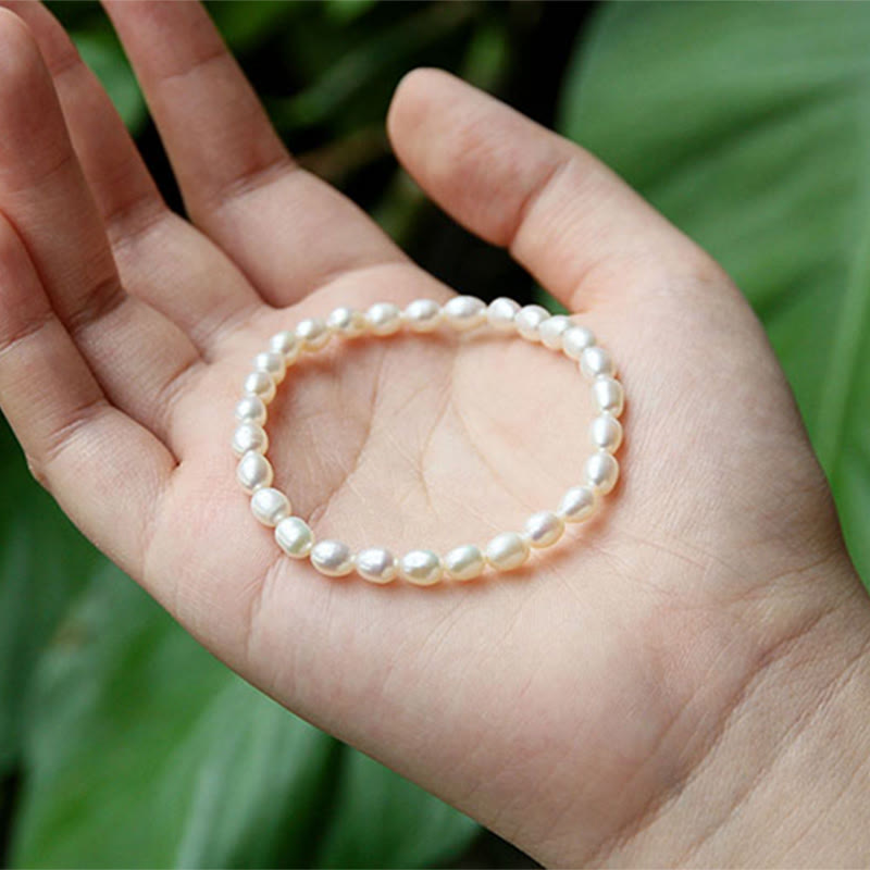 Armband Perle – Heilung weiße Perlen elastisch am Handgelenk getragen