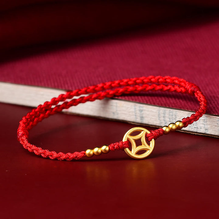 Rotes Armband Kupfer – Stärke mit goldenem Anhänger Flachaufnahme