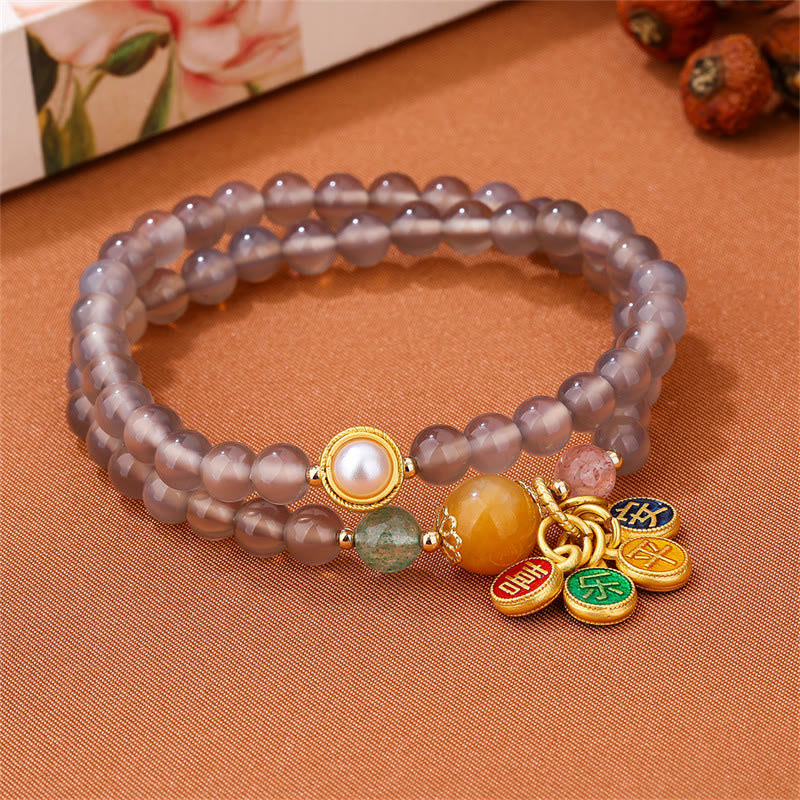 Armband Achat – Frieden & Balance mit Perlen und goldenen Charms elegant.
