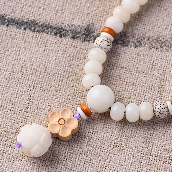 Armband Weiße Jade Bodhi Lotus – Segen mit Blütenperle elastisch