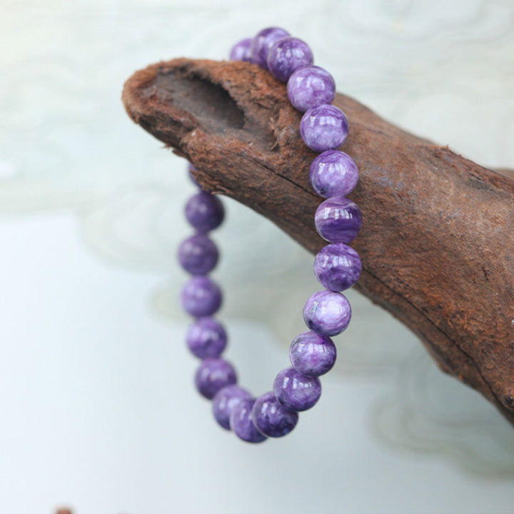 Armband Amethyst Kristall – Balance lila Perlen Holz Natur elegant