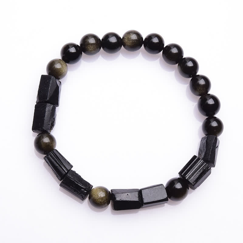 Obsidian Armband mit schwarzen Perlen und Hämatit Elementen flach gelegt