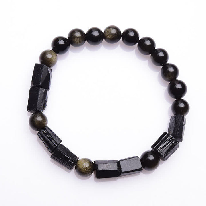 Obsidian Armband mit schwarzen Perlen und Hämatit Elementen flach gelegt