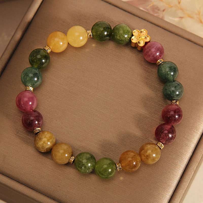 Buntes Tourmalin Armband mit goldener Blume Naturstein elastisch.