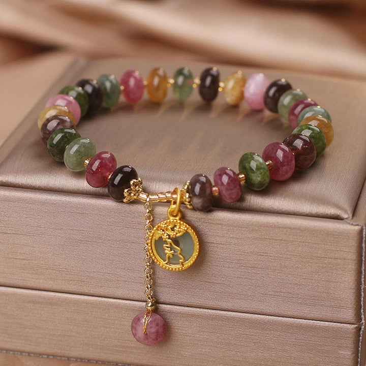 Buntes Turmalin Armband mit goldener Blume Hase Anhänger eleganz