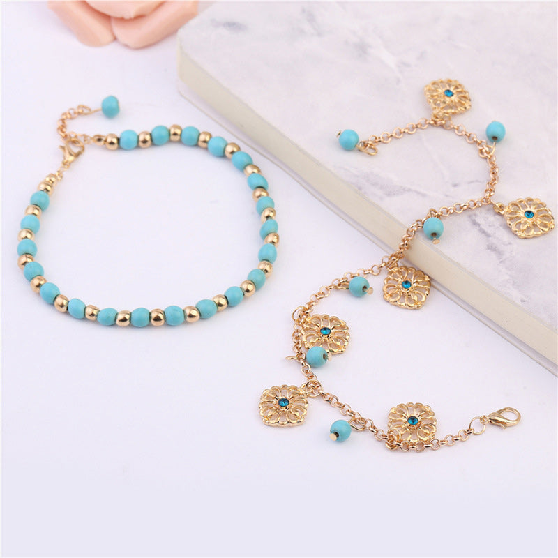 Armband Türkis – Schutz Gold Perlen Blüten Charm elegant