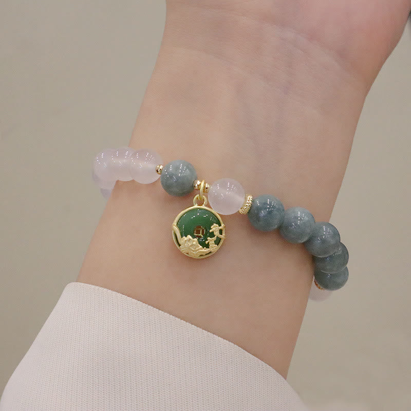 Armband Achat Jade Lotus Naturstein elastisch am Handgelenk getragen.