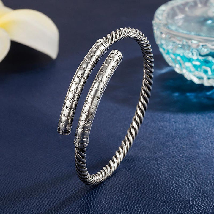 Armband Kupfer Herzsutra silber gedreht Muster elegant glänzend