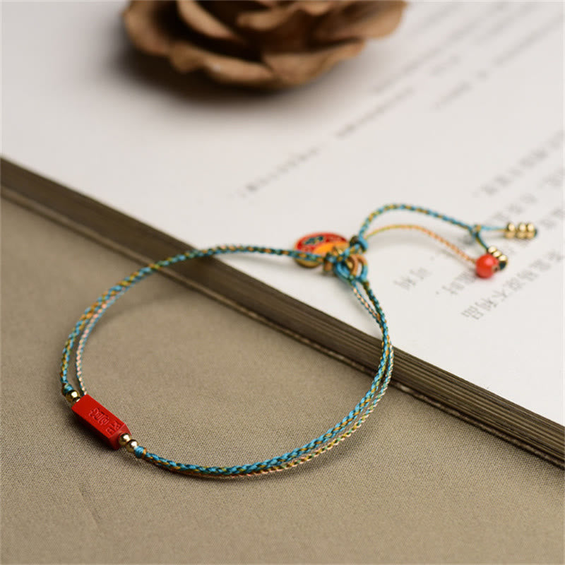Armband Zinnober – Segen & Balance mit roten Perlen Seidenschnur