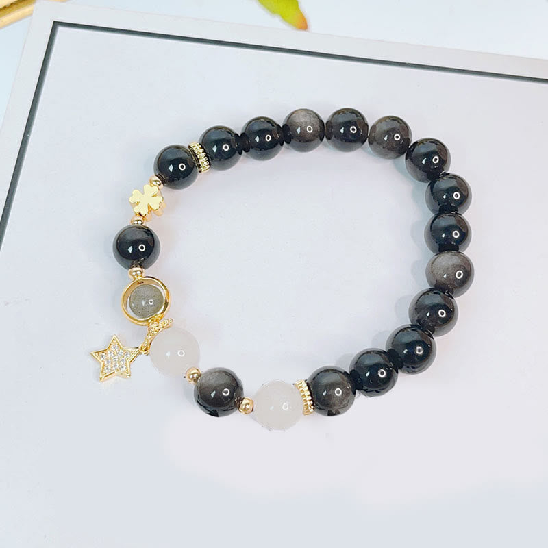 Schwarzes Obsidian Armband mit Silber Stern Anhänger elegant gestylt